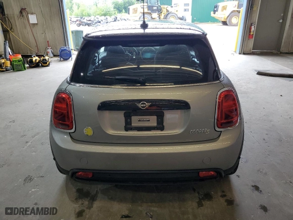 2023 MINI Hardtop 2 Door Cooper SE Signature with VIN WMW13DJ09P2T81795, listed as a Copart auction lot 65891834 with 13,680 mi miles and Salvage Title. Bid and sale history available at carsss.com. Image 6.