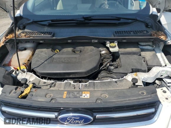 2013 Ford Escape SEL z VIN 1FMCU9H95DUD59797, wystawiony jako Copart lot #59533335 z przebiegiem 129 637 mil mil oraz Szkoda całkowita • Salvage title. Historia ofert i sprzedaży dostępna na DreamBid. Obrazek 12.