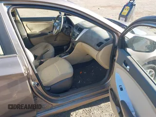 2012 Hyundai Accent GLS with VIN KMHCT4AE3CU114931, listed as a IAAI auction lot 41751304 with 166,831 mi miles. Bid and sale history available at carsss.com. Image 5.