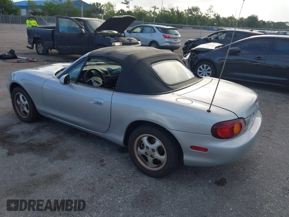 1999 Mazda MX-5 Miata with VIN JM1NB3534X0124237, listed as a IAAI auction lot 42536654 with 92,696 mi miles and . Bid and sale history available at DreamBid. Image 3.