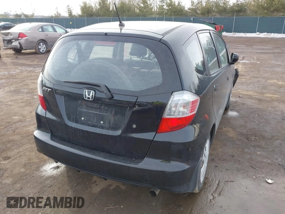 2010 Honda Fit with VIN JHMGE8H28AC014392, listed as a IAAI auction lot 41639302 with 147,433 mi miles. Bid and sale history available at carsss.com. Image 4.