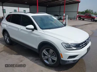2020 Volkswagen Tiguan SE z VIN 3VV3B7AX4LM032609, wystawiony jako IAAI lot #42074359 z przebiegiem 52 404 mil mil oraz . Historia ofert i sprzedaży dostępna na DreamBid. Obrazek 1.