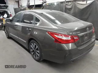2016 Nissan Altima S with VIN 1N4AL3APXGC114353, listed as a IAAI auction lot 42057688 with 84,562 mi miles and . Bid and sale history available at carsss.com. Image 3.