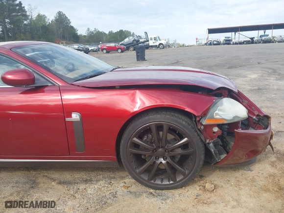 2008 Jaguar XK with VIN SAJWA44B485B24981, listed as a IAAI auction lot 41866497 with 84,920 mi miles. Bid and sale history available at carsss.com. Image 17.