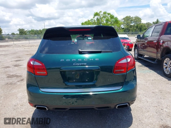 2014 Porsche Cayenne with VIN WP1AA2A21ELA06570, listed as a IAAI auction lot 42473298 with 61,421 mi miles and . Bid and sale history available at DreamBid. Image 17.