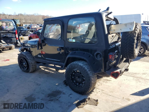 2004 Jeep Wrangler Rubicon with VIN 1J4FA69S74P785297, listed as a Copart auction lot 47332944 with 61,323 mi miles and Salvage Title. Bid and sale history available at carsss.com. Image 2.