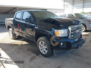 2019 GMC Canyon 2WD SLE z VIN 1GTG5CEN2K1238175, wystawiony jako IAAI lot #41964502 z przebiegiem 96 107 mil mil oraz . Historia ofert i sprzedaży dostępna na DreamBid. Obrazek 1.