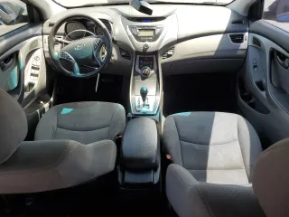2013 Hyundai Elantra GLS with VIN KMHDH4AE7DU487588, listed as a Copart auction lot 62098015 with 106,046 mi miles and Salvage title. Bid and sale history available at DreamBid. Image 8.