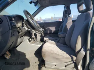 1999 Isuzu Rodeo S with VIN 4S2CK58W1X4349947, listed as a Copart auction lot 84634064 with 135,851 mi miles and Clean Title. Bid and sale history available at DreamBid. Image 7.