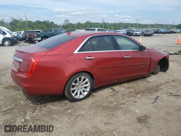 2014 Cadillac CTS Luxury AWD with VIN 1G6AX5SX0E0154757, listed as a Copart auction lot 56317425 with 156,719 mi miles and Salvage title. Bid and sale history available at DreamBid. Image 3.