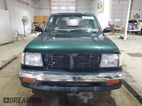 1999 Toyota Tacoma with VIN 4TANL42N4XZ453505, listed as a Copart auction lot 63399325 with 175,198 mi miles and Salvage title. Bid and sale history available at DreamBid. Image 5.