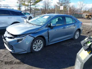 2023 Toyota Corolla Hybrid LE with VIN JTDBCMFE4P3025924, listed as a IAAI auction lot 41463750 with 9,553 mi miles. Bid and sale history available at carsss.com. Image 17.