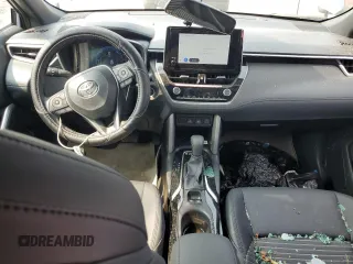 2023 Toyota Corolla Cross Hybrid S with VIN 7MUFBABG6PV014406, listed as a Copart auction lot 59944835 with 8,252 mi miles and Salvage title. Bid and sale history available at DreamBid. Image 8.