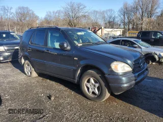 2000 Mercedes-Benz M-Class with VIN 4JGAB54E9YA152815, listed as a Copart auction lot 82996314 with 0 mi miles and Salvage Title. Bid and sale history available at carsss.com. Image 4.