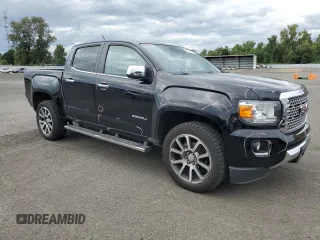 2020 GMC Canyon 4WD Denali with VIN 1GTG6EEN0L1243031, listed as a Copart auction lot 67939014 with 106,294 mi miles and Salvage Title. Bid and sale history available at carsss.com. Image 4.