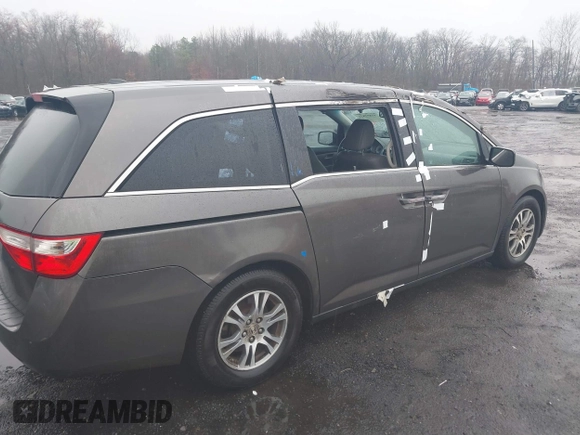 2012 Honda Odyssey EX-L with VIN 5FNRL5H64CB037689, listed as a IAAI auction lot 41857822 with 121,601 mi miles and . Bid and sale history available at carsss.com. Image 17.