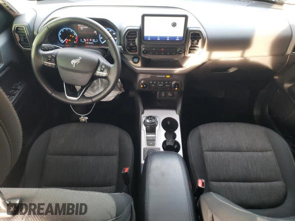 2023 Ford Bronco Sport Big Bend with VIN 3FMCR9B60PRD99510, listed as a Copart auction lot 87116324 with 29,261 mi miles and Salvage title. Bid and sale history available at DreamBid. Image 8.