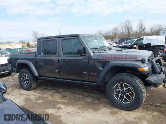 2024 Jeep Gladiator Rubicon z VIN 1C6JJTBG5RL110669, wystawiony jako IAAI lot #41694630 z przebiegiem 1 189 mil mil oraz . Historia ofert i sprzedaży dostępna na DreamBid. Obrazek 13.