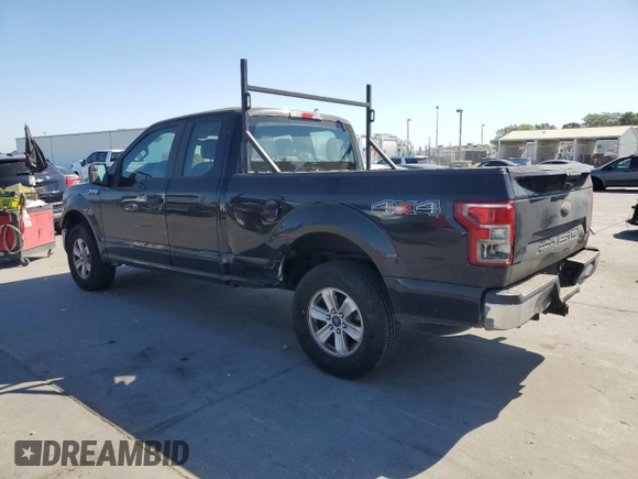 2018 Ford F-150 XL with VIN 1FTEX1EB2JKF61257, listed as a Copart auction lot 53674615 with 161,021 mi miles and Salvage title. Bid and sale history available at DreamBid. Image 2.
