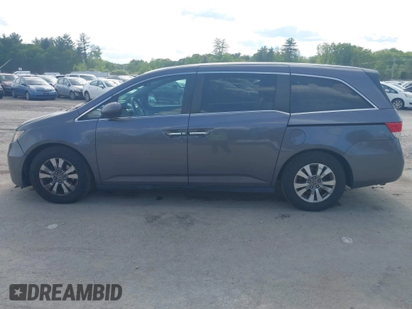 2015 Honda Odyssey EX-L z VIN 5FNRL5H69FB060423, wystawiony jako IAAI lot #42335707 z przebiegiem 175 770 mil mil oraz . Historia ofert i sprzedaży dostępna na DreamBid. Obrazek 14.