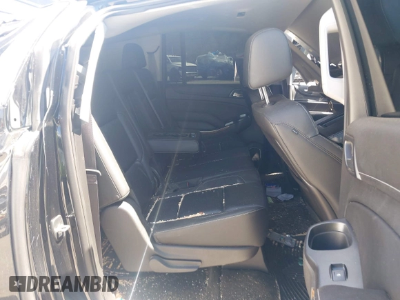 2015 Chevrolet Suburban LTZ with VIN 1GNSKKKC9FR280390, listed as a IAAI auction lot 41882449 with 80,499 mi miles and . Bid and sale history available at DreamBid. Image 8.