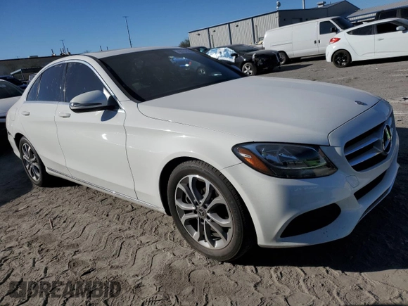 2018 Mercedes-Benz C 300 with VIN 55SWF4JB2JU273443, listed as a Copart auction lot 43762185 with 69,137 mi miles and Salvage Title. Bid and sale history available at DreamBid. Image 4.