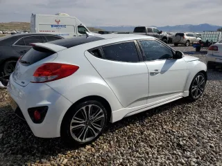 2016 Hyundai Veloster Turbo z VIN KMHTC6AE6GU302201, wystawiony jako Copart lot #54613235 z przebiegiem 105 796 mil mil oraz Szkoda całkowita • Salvage title. Historia ofert i sprzedaży dostępna na DreamBid. Obrazek 3.