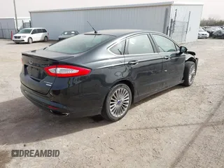 2015 Ford Fusion Titanium with VIN 3FA6P0K99FR268450, listed as a IAAI auction lot 41805513 with 202,009 mi miles. Bid and sale history available at carsss.com. Image 4.