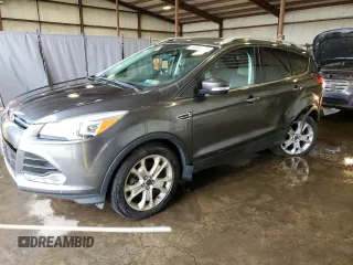 2016 Ford Escape Titanium with VIN 1FMCU9J92GUA89930, listed as a Copart auction lot 64441475 with 80,713 mi miles and Salvage title. Bid and sale history available at DreamBid. Image 1.