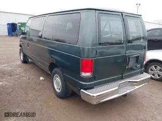 2001 Ford Econoline Wagon XL with VIN 1FMRE11LX1HB30194, listed as a IAAI auction lot 41497150 with 107,526 mi miles. Bid and sale history available at carsss.com. Image 3.