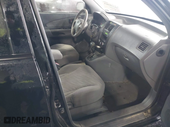 2005 Hyundai Tucson GL with VIN KM8JM12B75U072080, listed as a IAAI auction lot 41779464 with 191,771 mi miles. Bid and sale history available at carsss.com. Image 5.