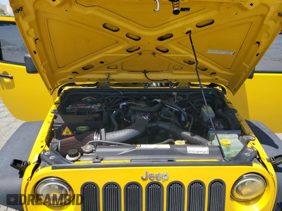 2008 Jeep Wrangler X with VIN 1J4FA24188L567678, listed as a Copart auction lot 60918635 with 185,368 mi miles and Salvage title. Bid and sale history available at DreamBid. Image 12.
