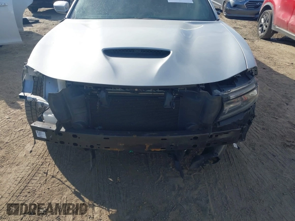 2019 Dodge Charger Scat Pack with VIN 2C3CDXGJXKH599632, listed as a IAAI auction lot 41666680 with 116,995 mi miles and . Bid and sale history available at DreamBid. Image 13.