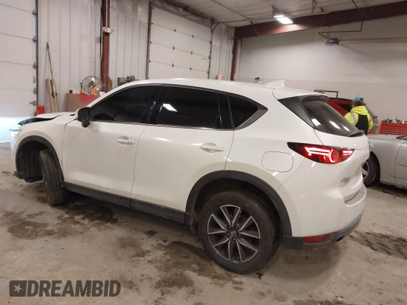 2018 Mazda CX-5 S Premium with VIN JM3KFBDM1J1412088, listed as a IAAI auction lot 41497431 with 65,532 mi miles and . Bid and sale history available at DreamBid. Image 3.