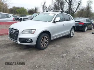 2013 Audi Q5 Premium with VIN WA1CFAFP7DA070577, listed as a IAAI auction lot 42021724 with 142,449 mi miles. Bid and sale history available at carsss.com. Image 2.
