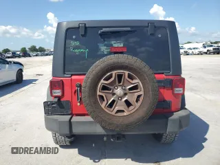 2014 Jeep Wrangler Unlimited Rubicon with VIN 1C4HJWFG5EL162736, listed as a Copart auction lot 64077645 with 126,330 mi miles and Salvage title. Bid and sale history available at DreamBid. Image 6.