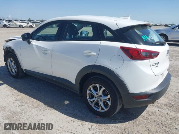2016 Mazda CX-3 Touring with VIN JM1DKBC71G0126040, listed as a IAAI auction lot 41860285 with 97,986 mi miles and . Bid and sale history available at DreamBid. Image 3.