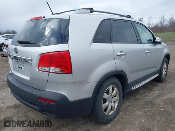 2012 Kia Sorento LX with VIN 5XYKTDA69CG280705, listed as a IAAI auction lot 42055542 with 142,770 mi miles. Bid and sale history available at carsss.com. Image 4.