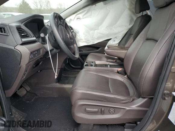 2023 Honda Odyssey EX-L z VIN 5FNRL6H69PB033309, wystawiony jako Copart lot #48559565 z przebiegiem 30 068 mil mil oraz Szkoda całkowita • Salvage title. Historia ofert i sprzedaży dostępna na DreamBid. Obrazek 7.