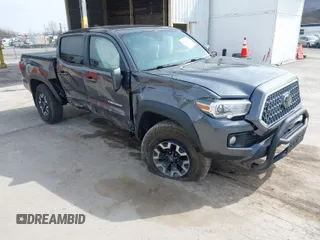 2018 Toyota Tacoma SR with VIN 3TMCZ5ANXJM187546, listed as a IAAI auction lot 41941130 with 83,288 mi miles. Bid and sale history available at carsss.com. Image 1.