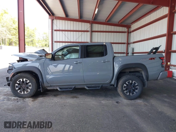 2023 Nissan Frontier SV z VIN 1N6ED1EK0PN673357, wystawiony jako IAAI lot #42420346 z przebiegiem 33 000 mil mil oraz . Historia ofert i sprzedaży dostępna na DreamBid. Obrazek 14.