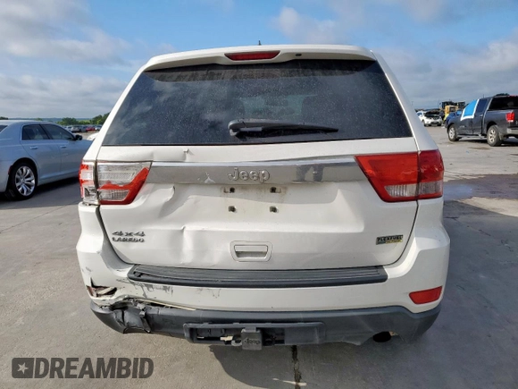 2011 Jeep Grand Cherokee Laredo z VIN 1J4RR4GG2BC617810, wystawiony jako Copart lot #62424125 z przebiegiem 205 945 mil mil oraz Szkoda całkowita • Salvage title. Historia ofert i sprzedaży dostępna na DreamBid. Obrazek 6.