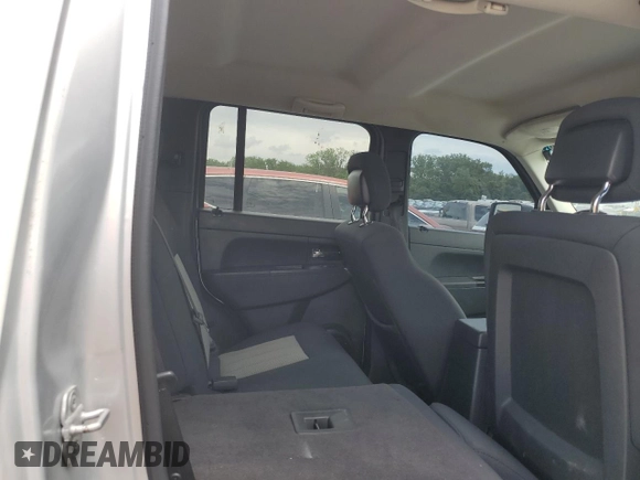 2010 Jeep Liberty Sport with VIN 1J4PN2GK2AW144063, listed as a Copart auction lot 58055585 with 132,580 mi miles and Salvage title. Bid and sale history available at DreamBid. Image 11.