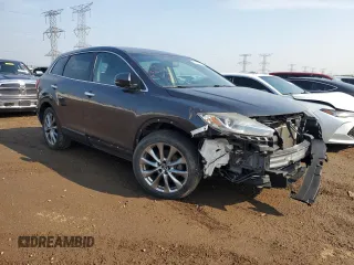 2014 Mazda CX-9 Grand Touring with VIN JM3TB3DVXE0443852, listed as a Copart auction lot 59106525 with 101,969 mi miles and Salvage title. Bid and sale history available at DreamBid. Image 4.