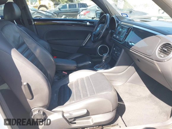 2012 Volkswagen Beetle with VIN 3VWV87AT1CM627756, listed as a IAAI auction lot 41657307 with 81,924 mi miles and . Bid and sale history available at DreamBid. Image 5.
