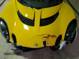 2005 Lotus Elise z VIN SCCPC11185HL33279, wystawiony jako Copart lot #87432634 z przebiegiem Nie podano mil oraz Szkody całkowita. Historia ofert i sprzedaży dostępna na DreamBid. Obrazek 11.
