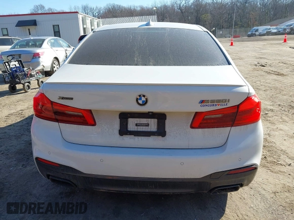 2018 BMW 5 Series M550i xDrive with VIN WBAJB9C53JB036097, listed as a IAAI auction lot 41743031 with 70,164 mi miles and . Bid and sale history available at carsss.com. Image 17.