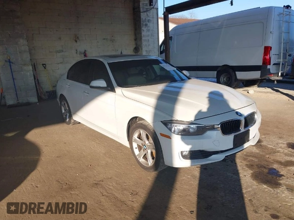 2013 BMW 3 Series 328i xDrive with VIN WBA3B5C56DF596114, listed as a IAAI auction lot 41313136 with 98,847 mi miles. Bid and sale history available at carsss.com. Image 1.