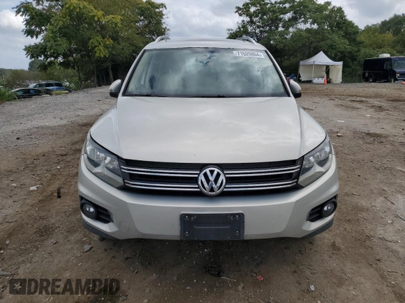 2013 Volkswagen Tiguan SE z VIN WVGBV7AX0DW539618, wystawiony jako Copart lot #71529804 z przebiegiem 148 362 mil mil oraz Szkoda całkowita • Salvage title. Historia ofert i sprzedaży dostępna na DreamBid. Obrazek 5.