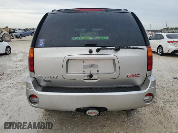 2004 GMC Envoy SLT with VIN 1GKDT13S742106035, listed as a Copart auction lot 77692884 with 122,188 mi miles and Non Repairable. Bid and sale history available at DreamBid. Image 6.